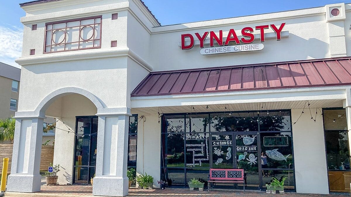 Exterior of Dynasty Chinese Cuisine restaurant at the Beach House Condominiums with clear signage.